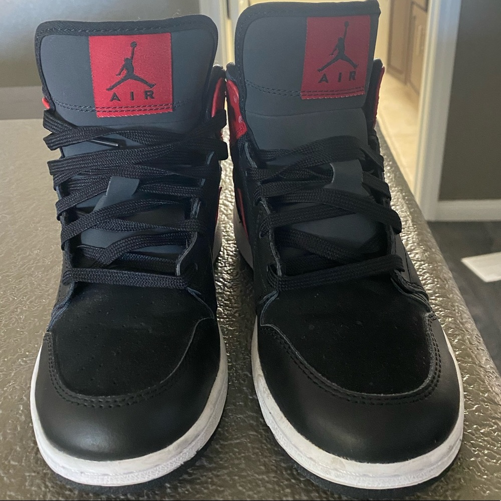 The Air Jordan 1 Mid “Bred”